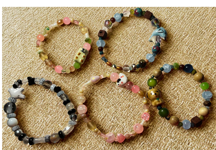 Ceramic, wood and glass beaded animal bracelets