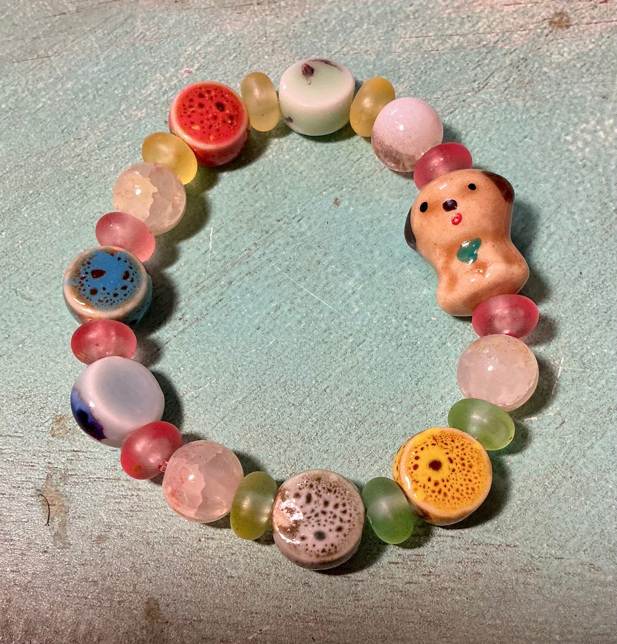 Ceramic, wood and glass beaded animal bracelets